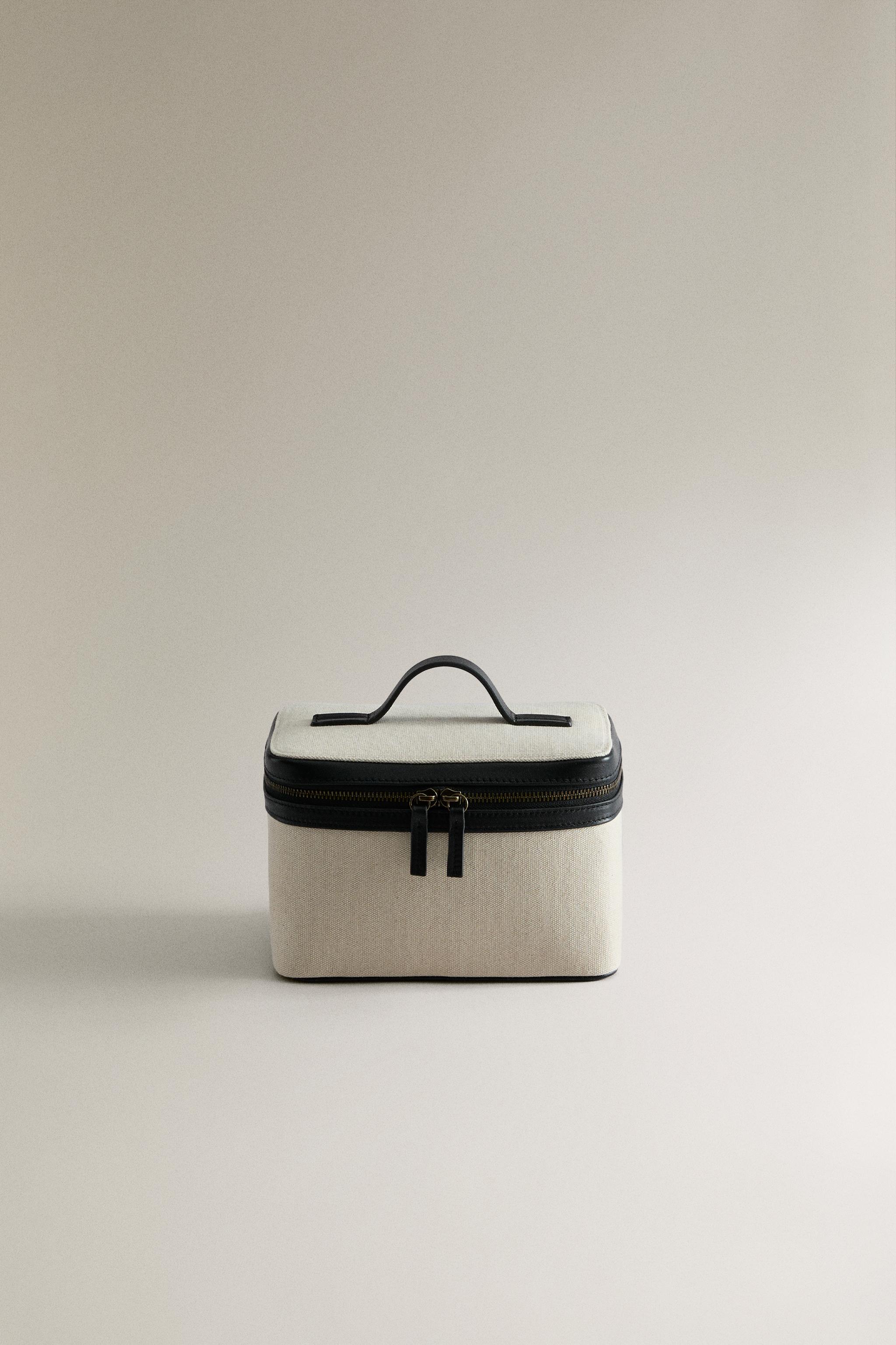 RIGID CANVAS AND LEATHER MAKEUP BAG